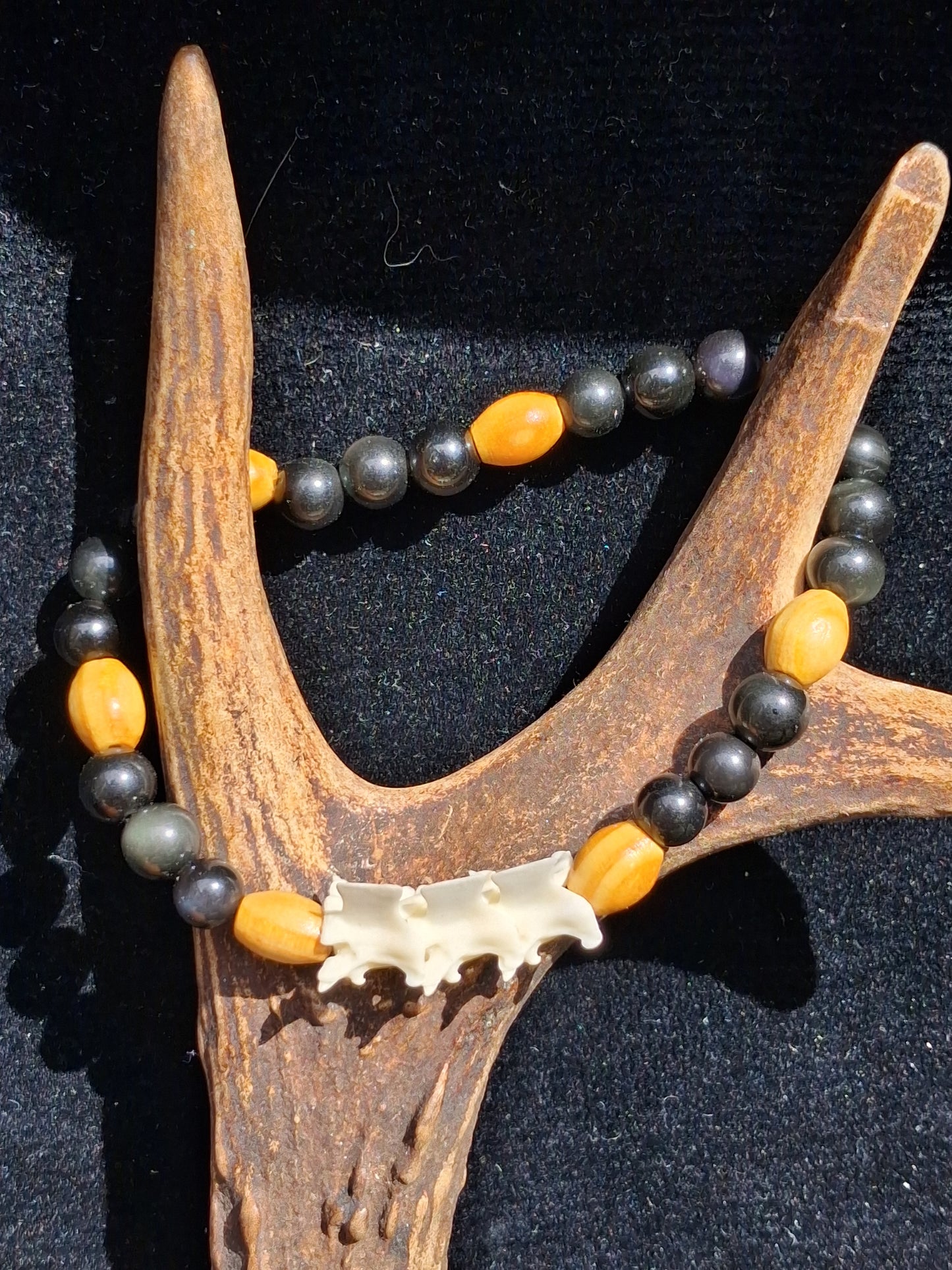 Snake vertebrae and gemstone bracelet