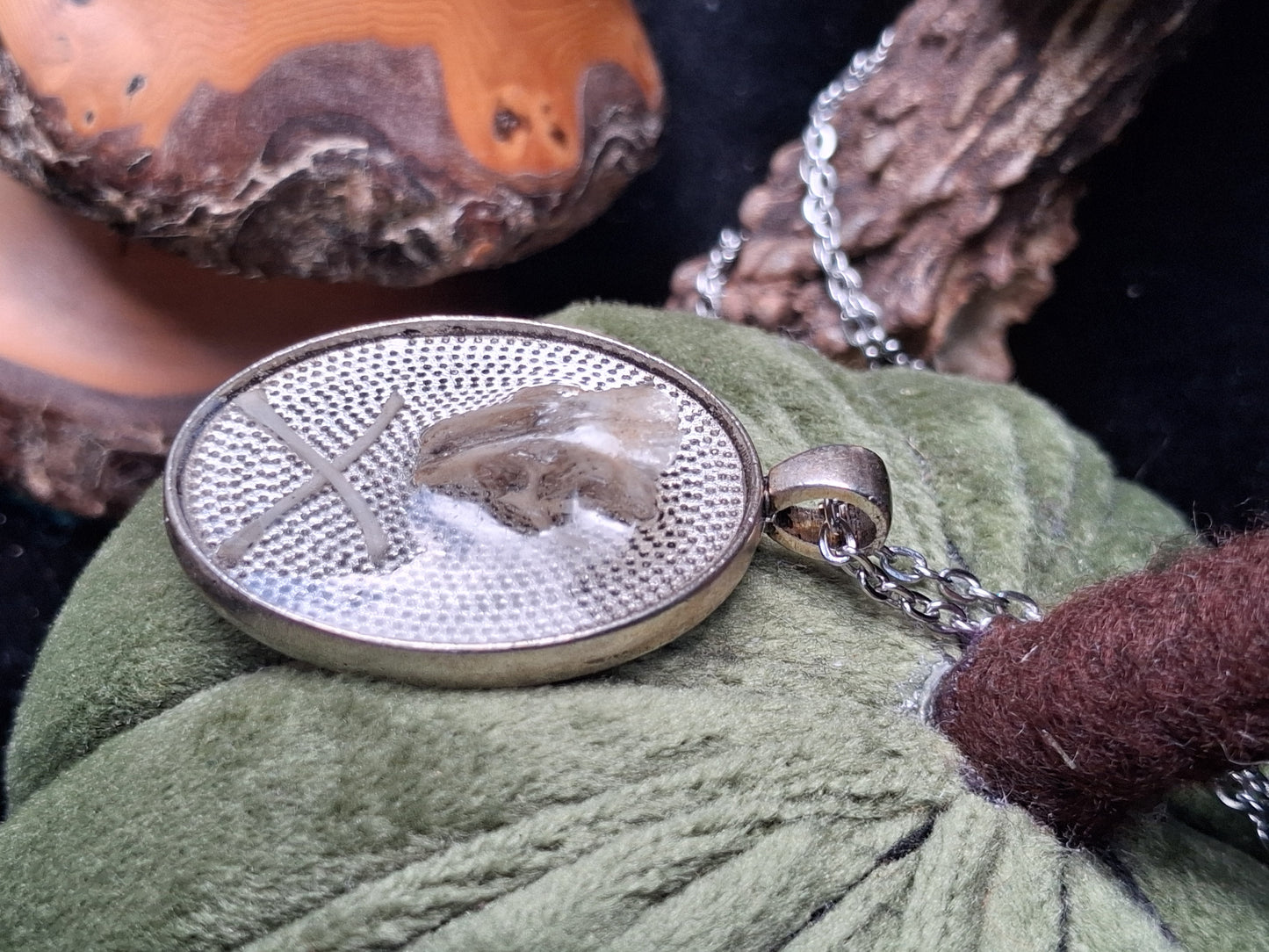 Mouse Bone necklaces encased in resin