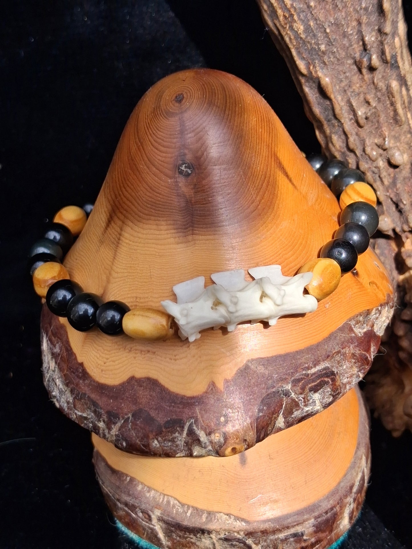 Snake vertebrae and gemstone bracelet