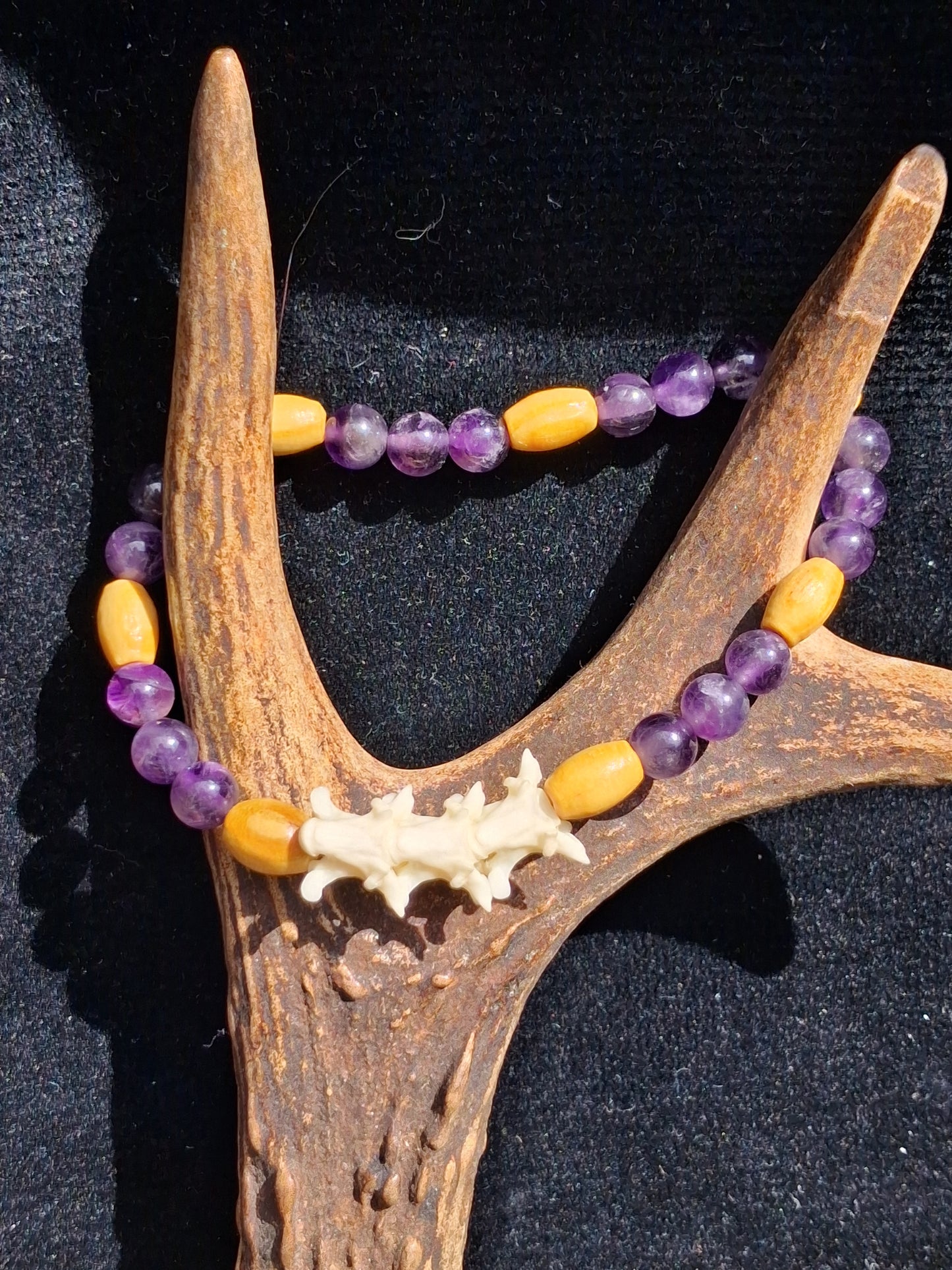 Snake vertebrae and gemstone bracelet